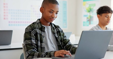 Image showing Teenager child, laptop and education at school with research, coding or computer science. Black kid in classroom with technology for learning, problem solving and system or software study at academy