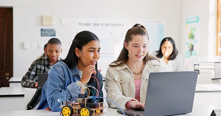 Image showing Robotics, education and children with laptop at school learning coding, robot or car toy. Girl students in classroom for technology, electronics or science for development, innovation or teamwork