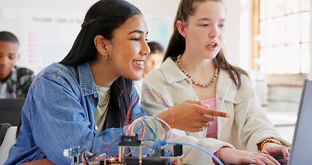 Image showing Robotics, children and education with laptop at school learning coding, robot or programming. Girl students in classroom for technology, electronics or science for development, innovation or teamwork