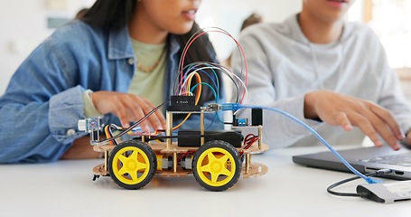 Image showing Robotics, education and hands of children at school learning about coding, robot or car toy in class. Kids in classroom for technology, electronics or science for development, innovation and teamwork