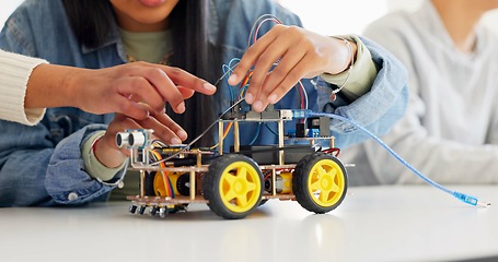 Image showing Technology, closeup and car robotics of students in classroom, education or learning electronics with cables and wire for innovation. School kids, learners and knowledge in science class for research