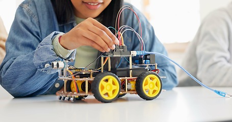 Image showing Technology, closeup and car robotics of students in classroom, education or learning electronics with cables and wire for innovation. School kids, learners and knowledge in science class for research