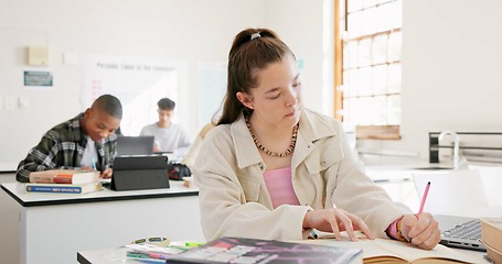 Image showing Classroom, student and girl writing, education and notebook with knowledge, development or studying. Group, academic or person with creativity, lesson or learning with assessment, thinking or academy