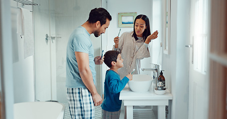 Image showing Parents, child and brushing teeth in family home bathroom while learning or teaching dental hygiene. A woman, man and kid with toothbrush and toothpaste for health, cleaning mouth and wellness