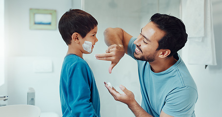 Image showing Shaving, bathroom and father teaching child about grooming, hygiene and facial routine. Happy, help and a young dad showing a boy kid cream or soap for hair removal together in a house in the morning
