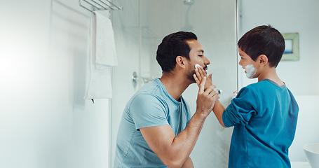 Image showing Shaving, bathroom and father teaching child about grooming, hygiene and facial routine. Happy, help and a young dad showing a boy kid cream or soap for hair removal together in a house in the morning