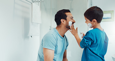 Image showing Father, child and learning with shaving cream or teaching a boy a skincare, morning beauty routine and grooming in the bathroom. Shave together, son and dad helping with foam, razor and skin care