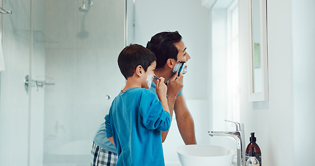 Image showing Dad, boy and learning to shave in bathroom with facial cream, skincare routine and support. Father, kid and teaching about cosmetics of cleaning face, beard and foam for love, care and family at home