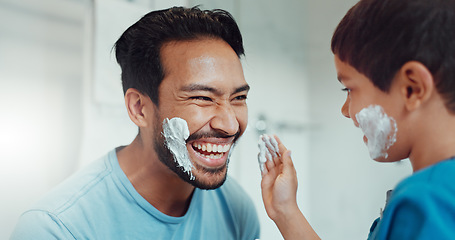 Image showing Shaving, bathroom and father teaching child about grooming, playing hygiene and facial routine. Playful, help and dad showing boy kid cream or soap for hair removal together in a house in the morning