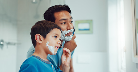 Image showing Dad, boy and learning to shave in bathroom with facial cream, skincare routine and support. Father, kid and teaching about cosmetics of cleaning face, beard and foam for love, care and family at home