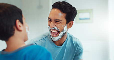 Image showing Shaving cream, child and father together in bathroom, family home or boy learning morning skincare, beauty and grooming routine. Funny, happy dad and son helping with foam, razor and skin care