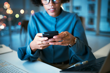 Image showing Night, phone and hands of business woman in office with social media, text or chat communication. Working late, message and female entrepreneur with smartphone app for internet, search or reading