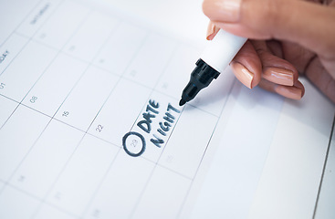 Image showing Person, hand and marker on calendar for date, schedule planning or agender on paper on office desk. Closeup of woman writing daily plan, anniversary or tasks for reminder or memory at workplace