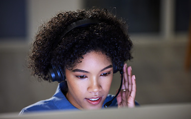 Image showing Computer, call center headset and business woman consulting, communication and reading customer service report. Night tech support, online discussion and agent telemarketing for ecommerce sales pitch