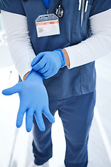 Image showing Gloves, hospital and hands of doctor for medical service, surgery and working in clinic for wellness. Healthcare, help and person with ppe for safety, protection and hygiene for support or procedure
