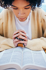 Image showing Praying, bible and woman with religion, rosary and spiritual with guidance, healing or Christian with faith. Person, girl or believer with holy scripture, book or home with help, worship or gratitude