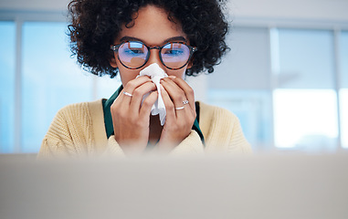 Image showing Sick business woman on computer, blowing nose and covid allergy, disease or virus in startup company. Professional, tissue paper and allergies for health problem, cold fever and bacteria in winter
