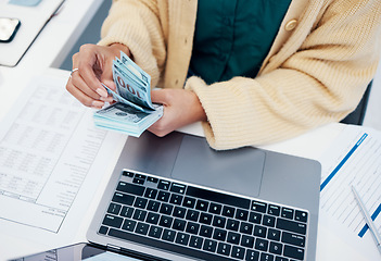 Image showing Hands, laptop and a business person counting money closeup in the office of a bank for accounting. Cash, budget and trading with a financial advisor in the workplace for investment growth from above