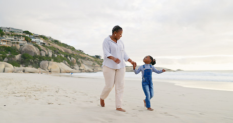 Image showing Black family, mother and daughter holding hands, walk on beach and bonding with love and care outdoor. Happiness, freedom and travel, woman and young girl on holiday with trust and support in nature