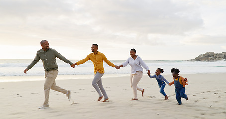 Image showing Happy, black family and holding hands or running at the beach for holiday, care and bonding. Laughing, support and grandparents, father and children with affection and exercise by the sea with love