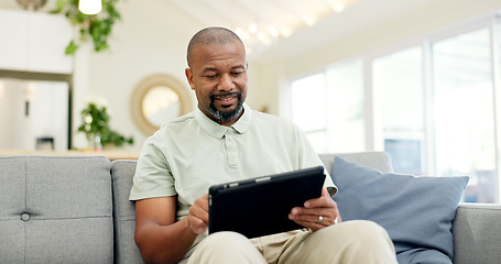 Image showing Technology, mature man with tablet and in living room of his home happy for social media. Online communication or networking, connectivity or leisure and black male person on couch with smile
