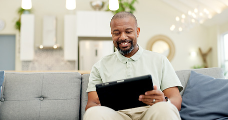 Image showing Technology, mature man with tablet and in living room of his home happy for social media. Online communication or networking, connectivity or leisure and black male person on couch with smile