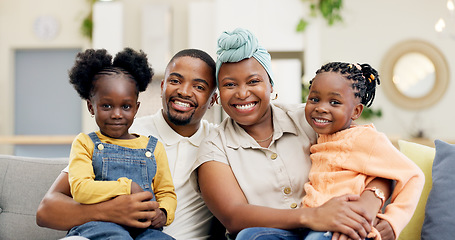 Image showing Black family, love and parents with child on sofa at home for bonding, quality time and happiness. Portrait, lounge and happy mother, father and girl on couch smile together for fun in living room