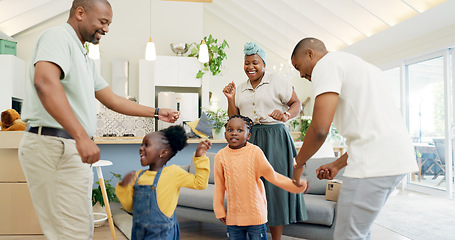 Image showing Moving, boxes and parents with kids dancing in living room of new house, happiness and investing in home. African mother, father and children with cardboard box, real estate and happy black family.