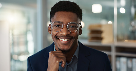 Image showing Young businessman, face and glasses in office with confident and positive attitude for startup at work. Employee, professional and portrait of entrepreneur and happy or ready for career in accounting