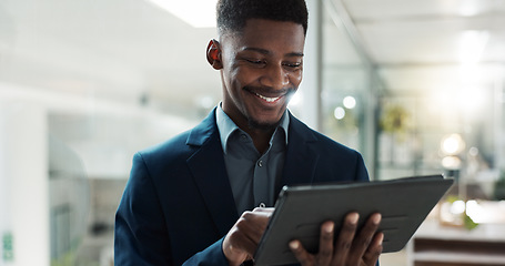 Image showing Tablet, networking and businessman in the office typing a message on the internet or mobile app. Digital technology, chatting and African male lawyer scroll on social media or website in workplace.