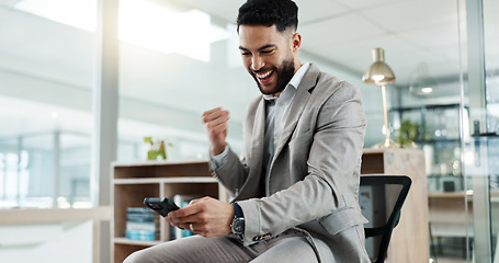 Image showing Business man, phone and fist celebration for profit, bonus or success on stock market, fintech app or crypto. Trader, entrepreneur and winner on smartphone for gambling, lotto or promotion in office