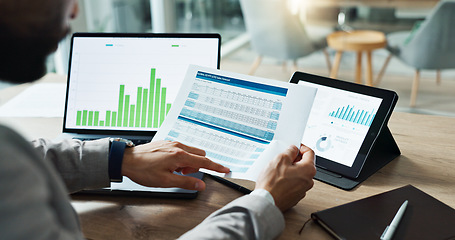 Image showing Hands, laptop and chart with paper for business man, analysis or check progress of economy, investment or profit. Financial agent, pc and reading graph for data document, growth or numbers for future