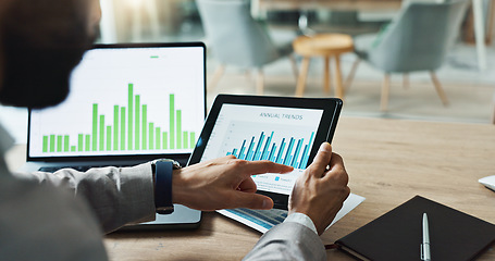 Image showing Hands, laptop and chart with tablet for business man, analysis or check progress of economy, investment or profit. Financial agent, pc and reading graph for data on fintech app, growth and numbers