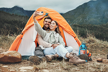 Image showing Couple, tent and happy in camping selfie, memory and holiday on web blog, morning and countryside. Man, woman and relax with vacation, social network post and adventure with love, outdoor and freedom