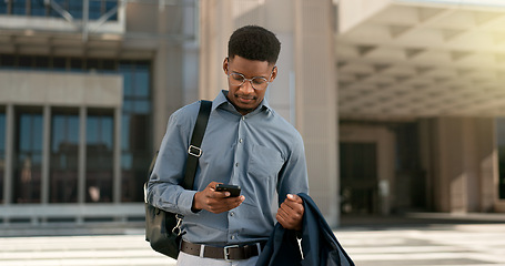 Image showing Man, walking and texting from work, corporate clothes and wondering in city, buildings and outside. Professional, employee and leaving on social media, communicating and thinking of day, text or post