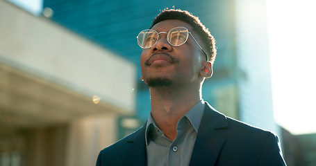 Image showing Black man in business, thinking about future ideas and corporate employee outdoor, dream and inspiration. Insight, decision and brainstorming with goals, mind with travel or commute to work in city