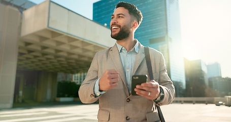 Image showing Walking, phone or businessman winning in city for bonus, financial profit or social media notification. News, yes or happy entrepreneur in celebration of deal victory, online goal or trading success