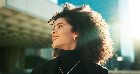 Image showing Face, thinking and wind with a business black woman in the city for growth, opportunity or inspiration. Idea, street and smile with a happy young employee looking around an urban town for vision