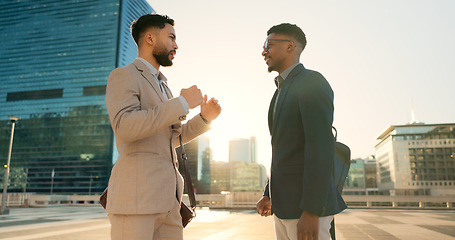 Image showing Men, colleagues and talking outside in corporate clothes, advice or career growth tips. Planning, teamwork and city buildings on commute, discussion and businessmen for collaboration, project or goal