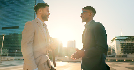 Image showing Men, colleagues and talking outside in corporate clothes, advice or career growth tips. Planning, teamwork and city buildings on commute, discussion and businessmen for collaboration, project or goal