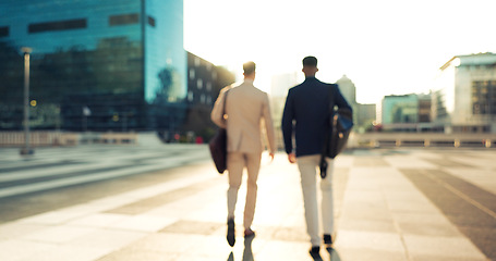 Image showing Men, colleagues and talking outside in corporate clothes, advice or career growth tips. Planning, teamwork and city buildings on commute, discussion and businessmen for collaboration, project or goal