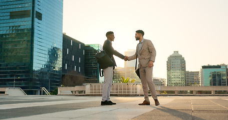 Image showing Partnership, walking or business people shaking hands in city for project agreement or b2b deal. Teamwork, outdoor handshake or men meeting for a negotiation, offer or networking opportunity together