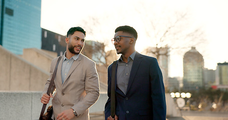 Image showing Businessmen, morning sunrise and walking to work while talking, strategy idea and business investment. Discussion, city buildings and colleagues commute together to plan, startup company and idea