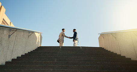 Image showing Steps, walking or business people shaking hands in city for project agreement or b2b deal. Teamwork, outdoor handshake or men meeting for a negotiation, offer or partnership opportunity together