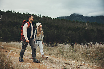 Image showing Backpack, fitness and couple hiking in nature with peace, love and bonding on forest adventure. Freedom, travel and active people outdoor walking, calm and enjoy weekend journey together on vacation