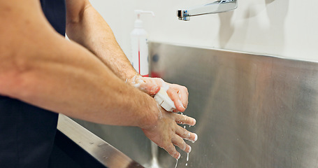 Image showing Doctor, washing hands and soap by scrub for surgery for operation, hygiene and disease. Person, surgeon and closeup for preparation, clean or protection in medicine for healthcare, hospital or clinic