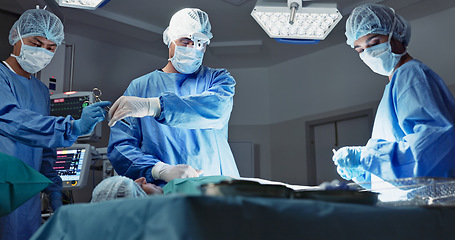 Image showing Doctors, team or scissors for surgery in theater with medical support, healthcare or operation at hospital. Surgeon, medicine and teamwork or collaboration with tools for cardiology or emergency help