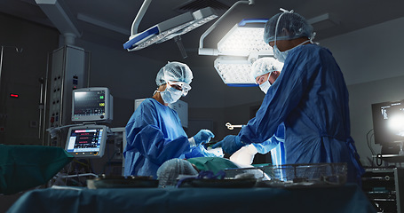 Image showing Doctors, team and surgery in theater with medical support for healthcare, safety and operation room at hospital. Surgeon, medicine and teamwork or collaboration with tools for cardiology or emergency