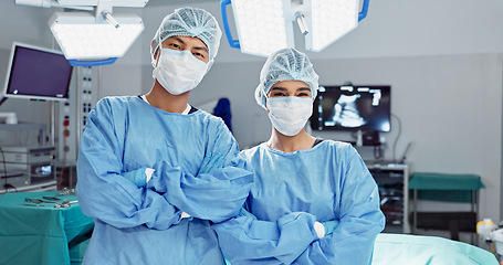 Image showing Team, doctor and arms crossed with mask of professional in ICU for surgery, healthcare or procedure at hospital. Medical surgeon people in confidence, expert or teamwork for emergency care at clinic