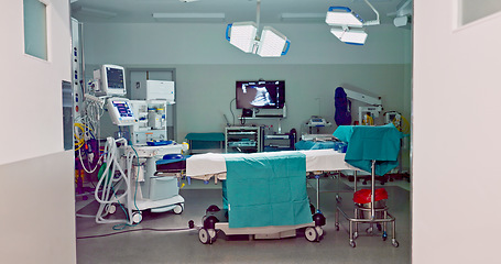 Image showing Empty hospital, medical and operation room for emergency service, healing patient and interior. Healthcare backgrounds, surgery theatre and bed with machine tools for wellness, medicine and treatment